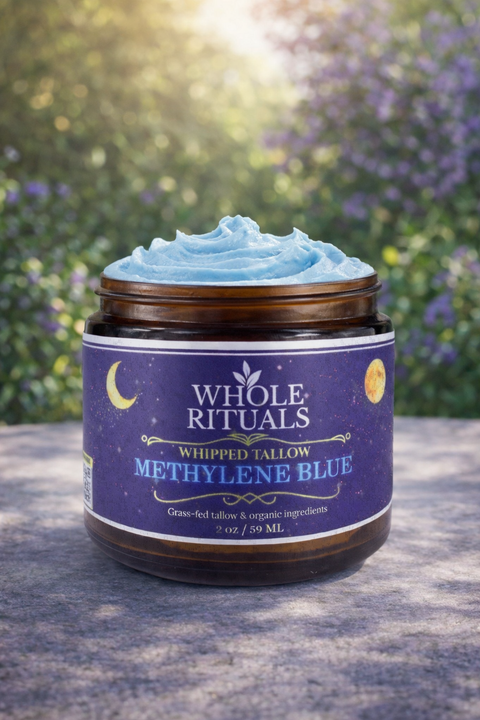 Jar of Whole Rituals Methylene Blue whipped tallow on a surface with a blurred natural background