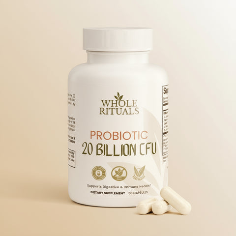 White supplement bottle labeled 'Whole Rituals Probiotic 20 Billion CFU' with two capsules on a white background