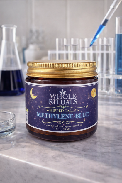 Jar of Whole Rituals Methylene Blue on a laboratory counter with test tubes in the background.