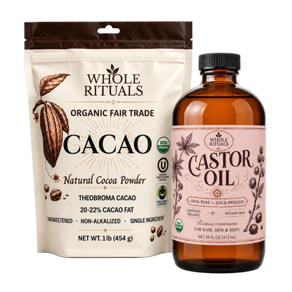 A Whole Rituals Organic Fair Trade Cacao bag standing next to a Whole Rituals Castor Oil bottle on a clean white background.
