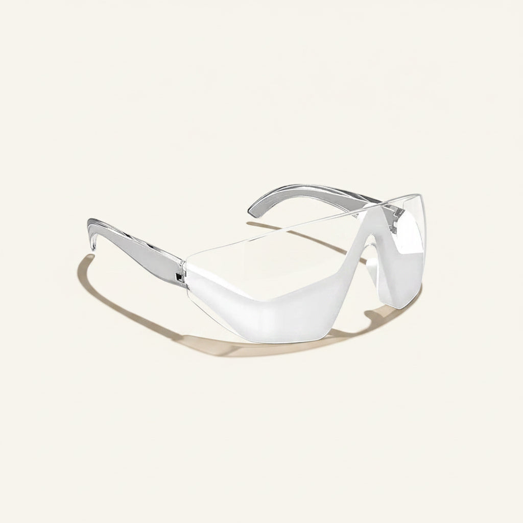 White safety goggles with silver frames on a white background