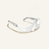 White safety goggles with silver frames on a white background