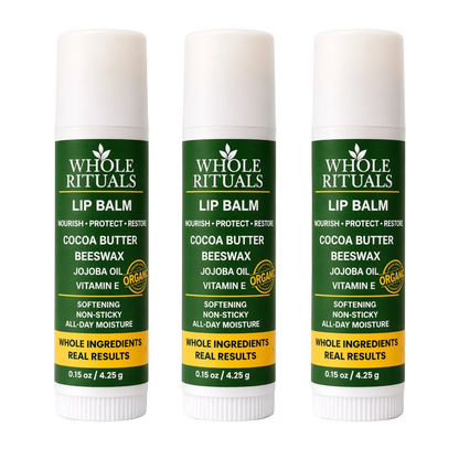 Three Whole Rituals lip balms on a white background