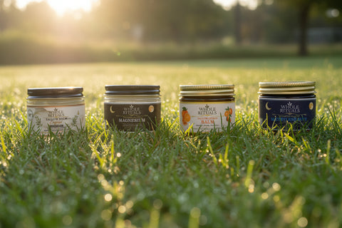 Four jars of Whole Rituals balm on a white background