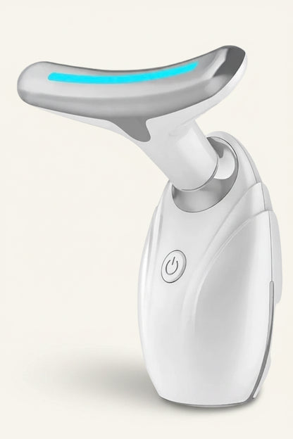 White electronic device with a blue light on a white background