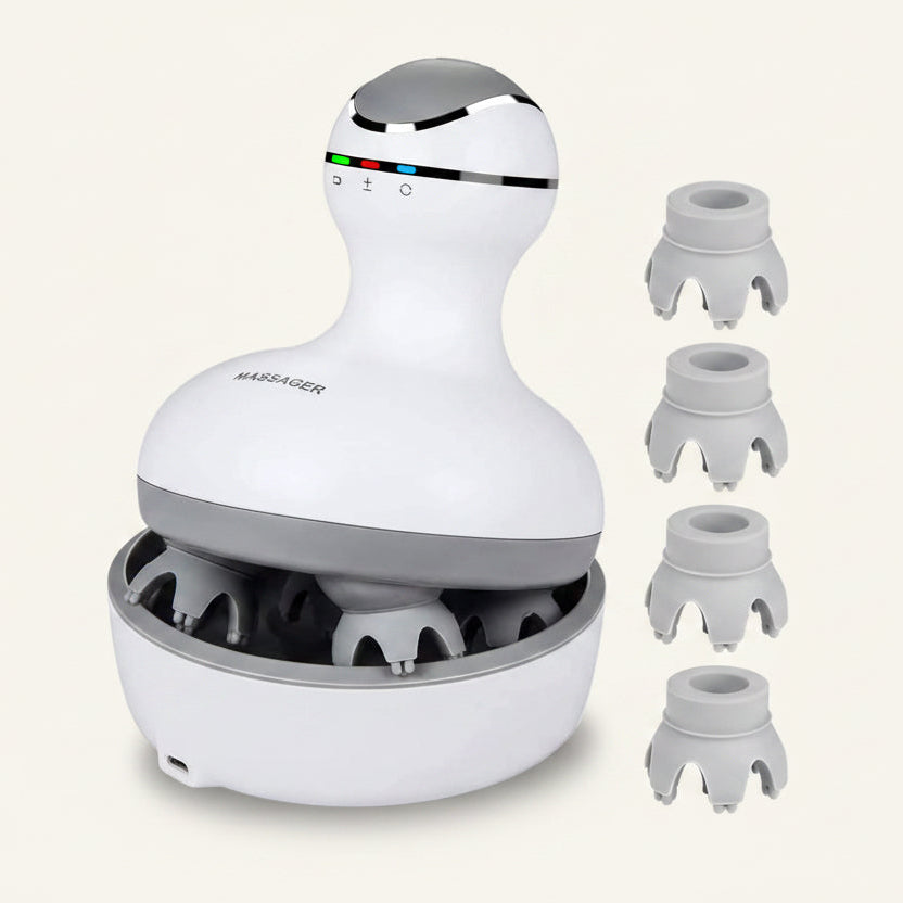 A white and gray electric scalp massage device with four interchangeable massage heads displayed on the right, set against a solid off-white background.